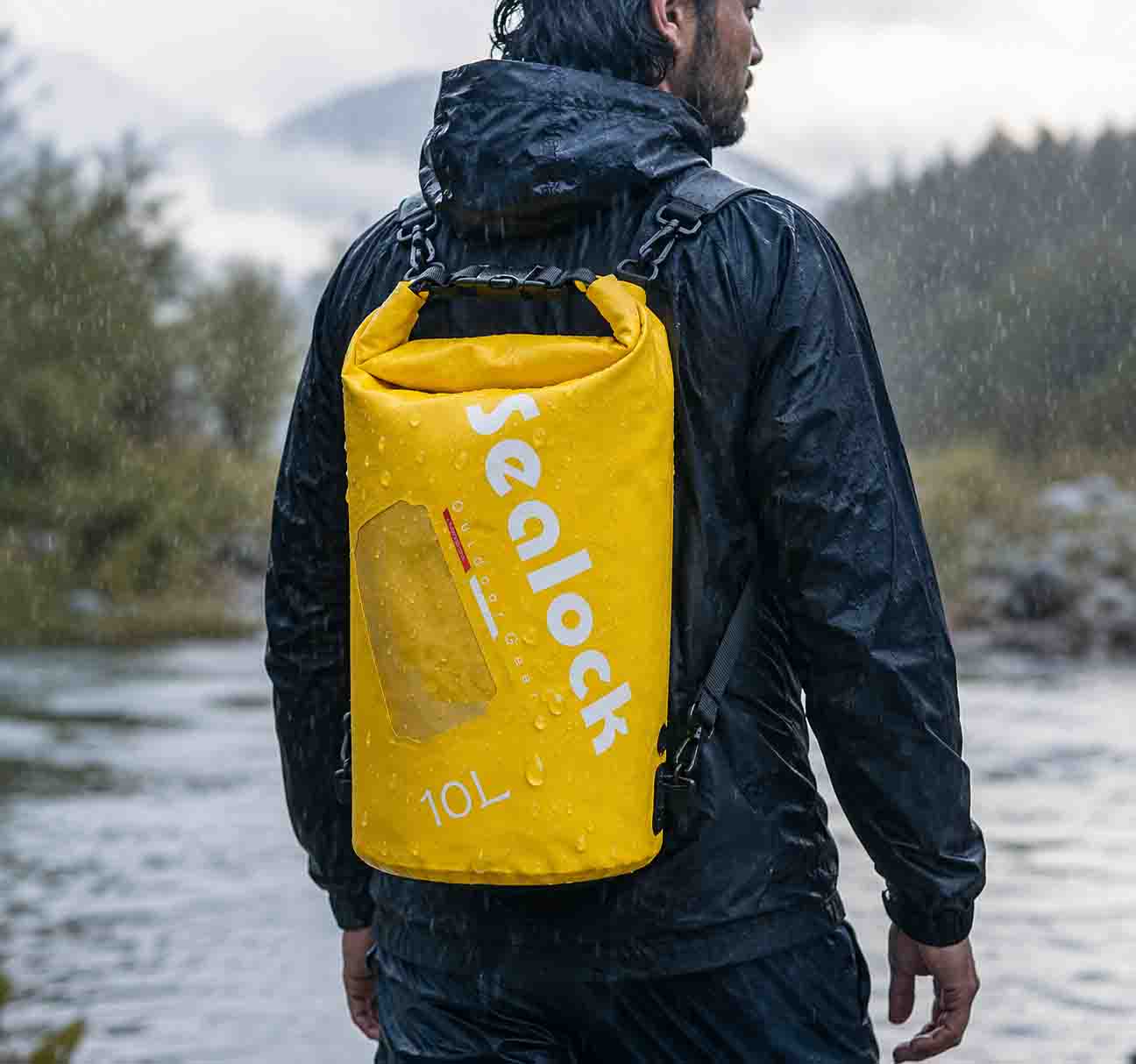 Actual shots of the waterproof backpack being used by the water or on rainy days